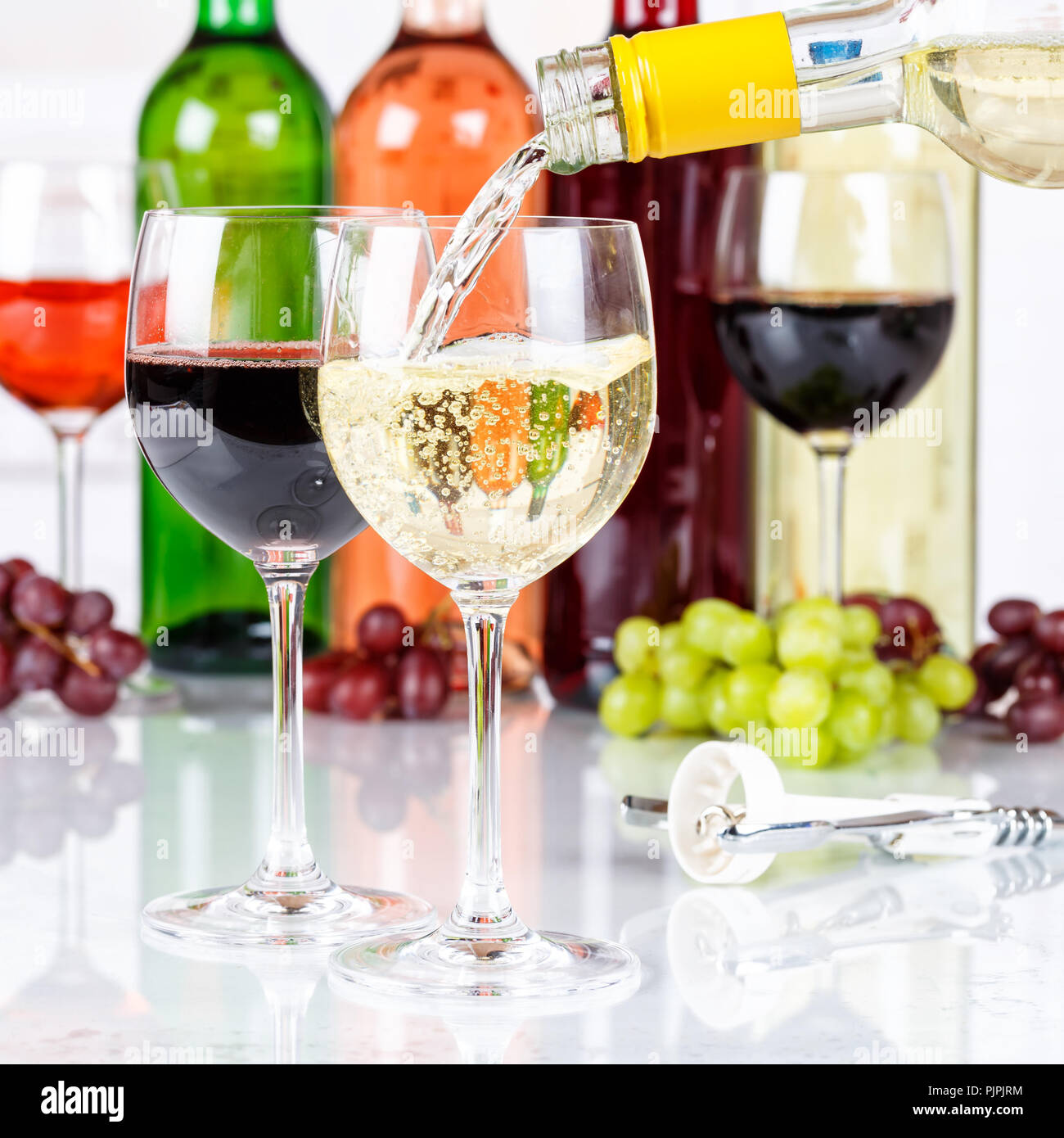 Wine pouring glass bottle white square pour alcohol Stock Photo