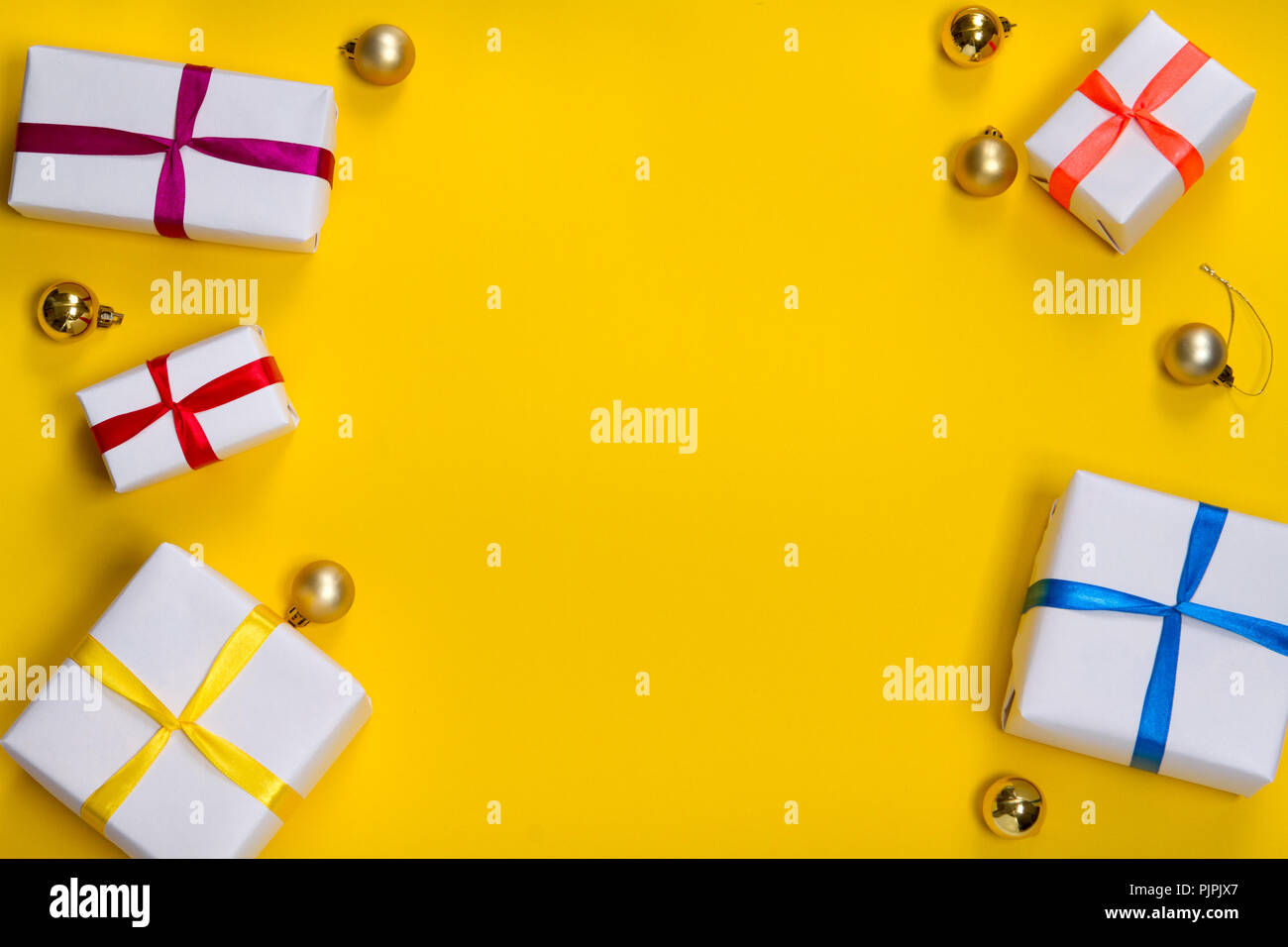 Download Gift Box On Yellow Background Stock Photo Alamy PSD Mockup Templates