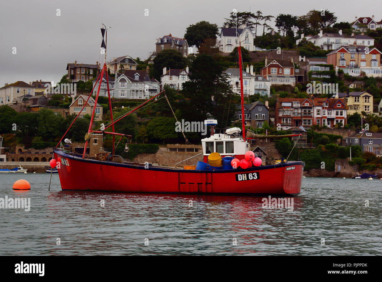 A fishing boat moored on the River Dart by Kingswear in Devon, waiting for the next opportunity to go to the English channel fishing grounds. Stock Photo