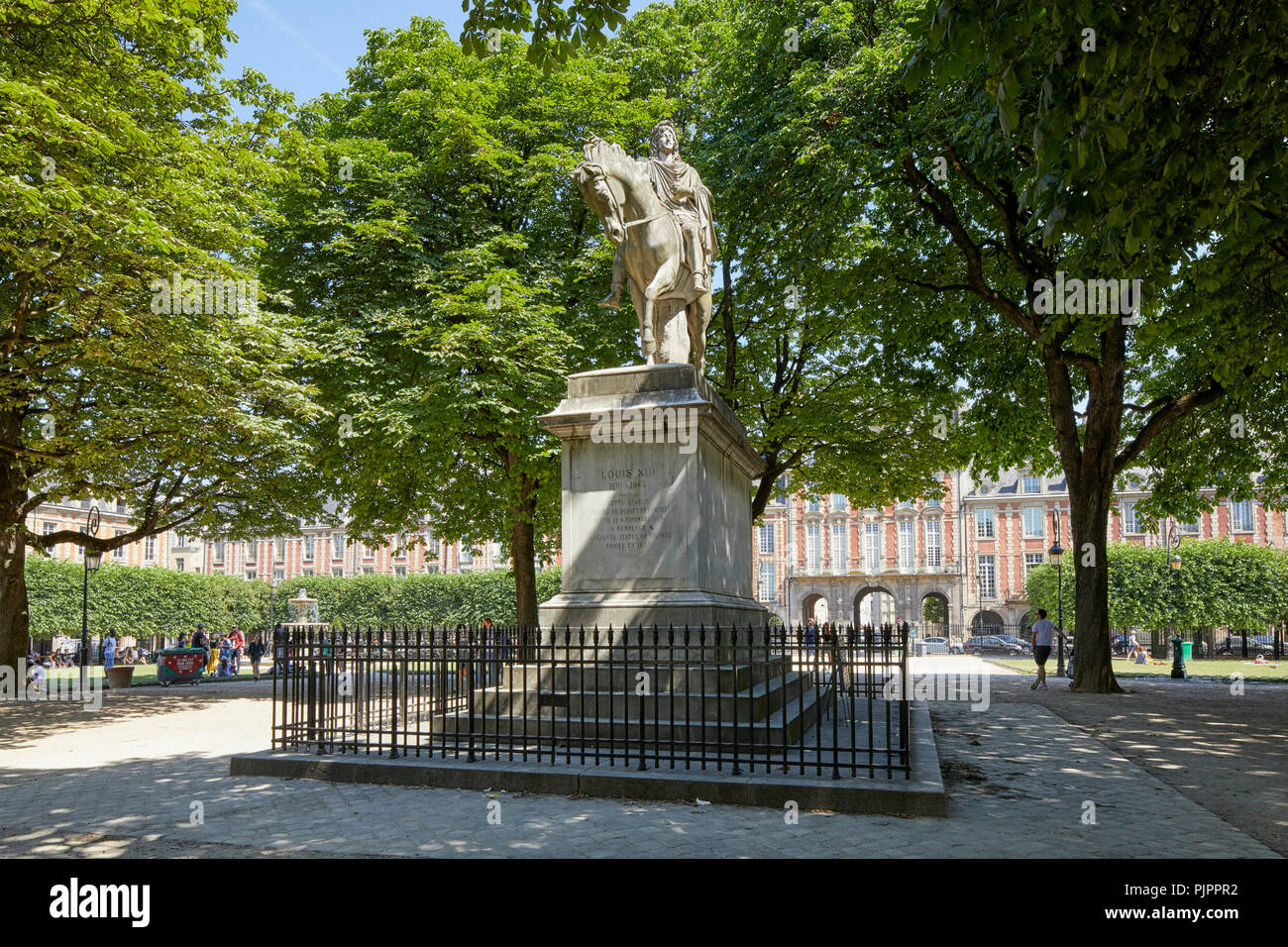 A statue of Louis XIII in Place des Vosges, Paris, France, Europe Stock Photo