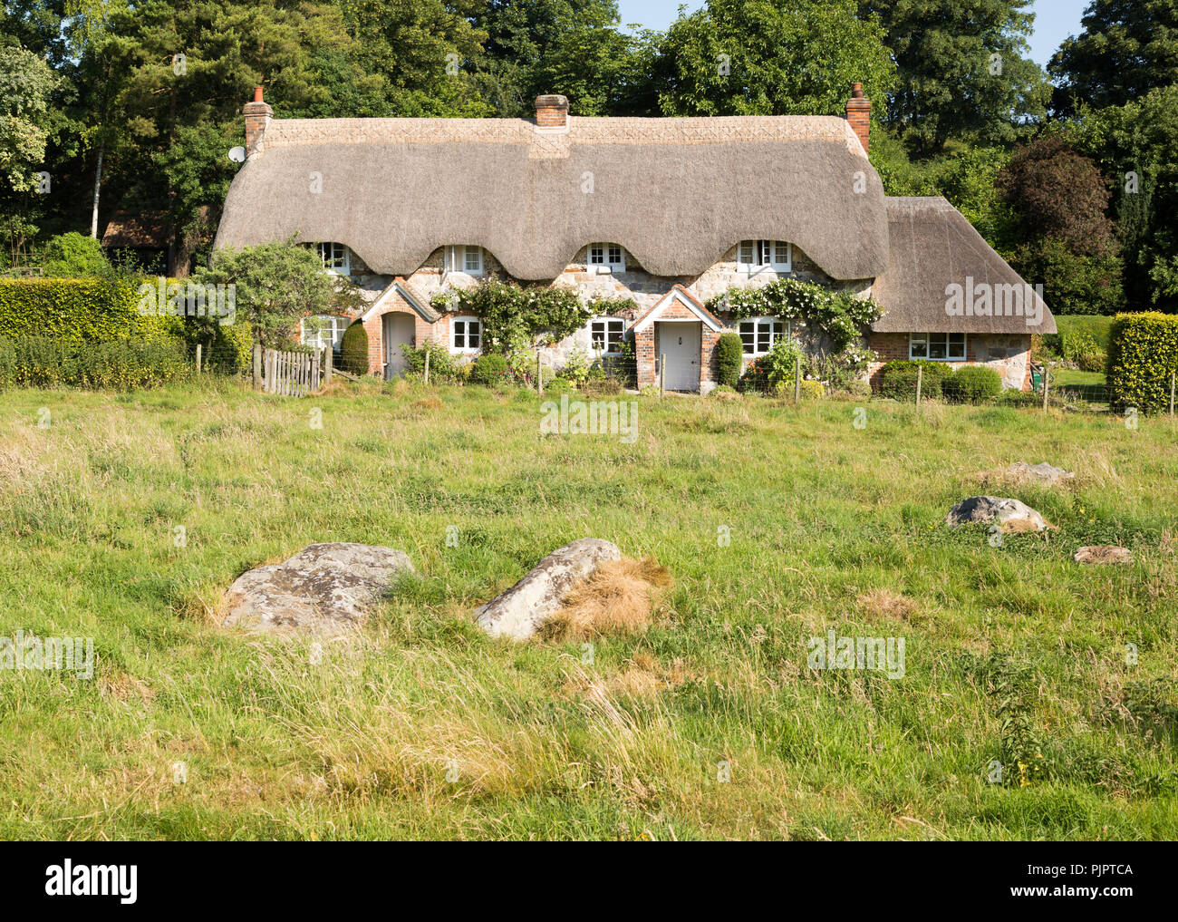 Historic attractive thatched cottages, Lockeridge Dene, near Marlborough, Wiltshire, England, UK