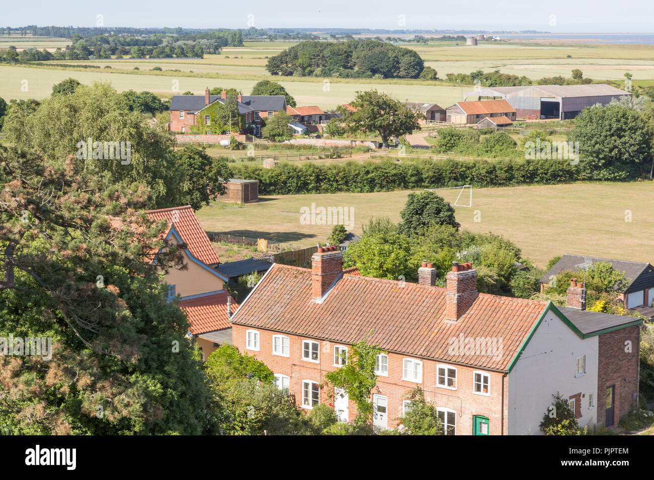 North Sea village landscape over fields in summer at Bawdsey, Suffolk, England, UK view from church tower Stock Photo