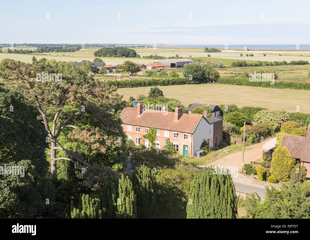 North Sea farming landscape over fields in summer at Bawdsey, Suffolk, England, UK view from church tower Stock Photo