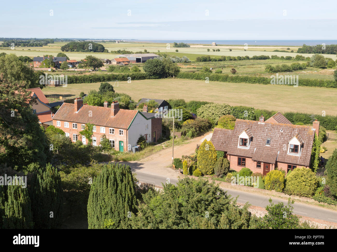 North Sea farming landscape over fields in summer at Bawdsey, Suffolk, England, UK view from church tower Stock Photo