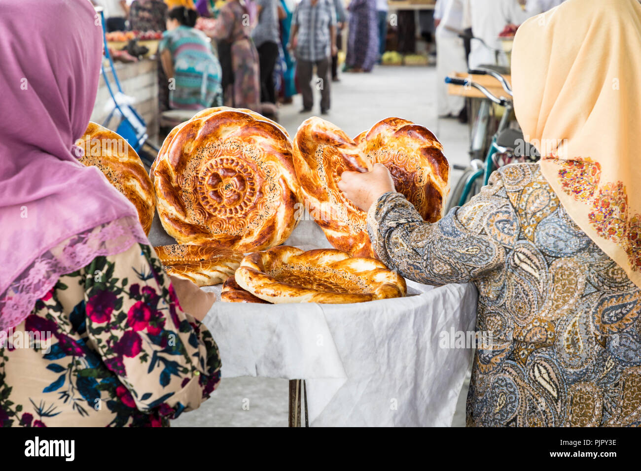Traditional uzbekistan bread lavash at local bazaar, is a soft flat-bread of Middle Asia (Uzbekistan). - Stock Image
