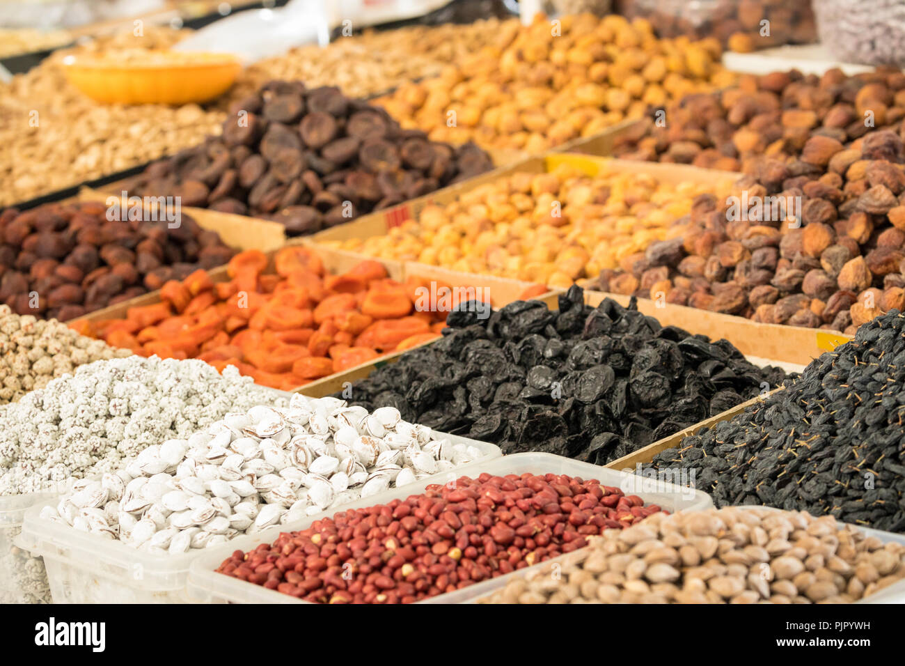 Dried fruits and nuts on local food market in Tashkent, Uzbekistan