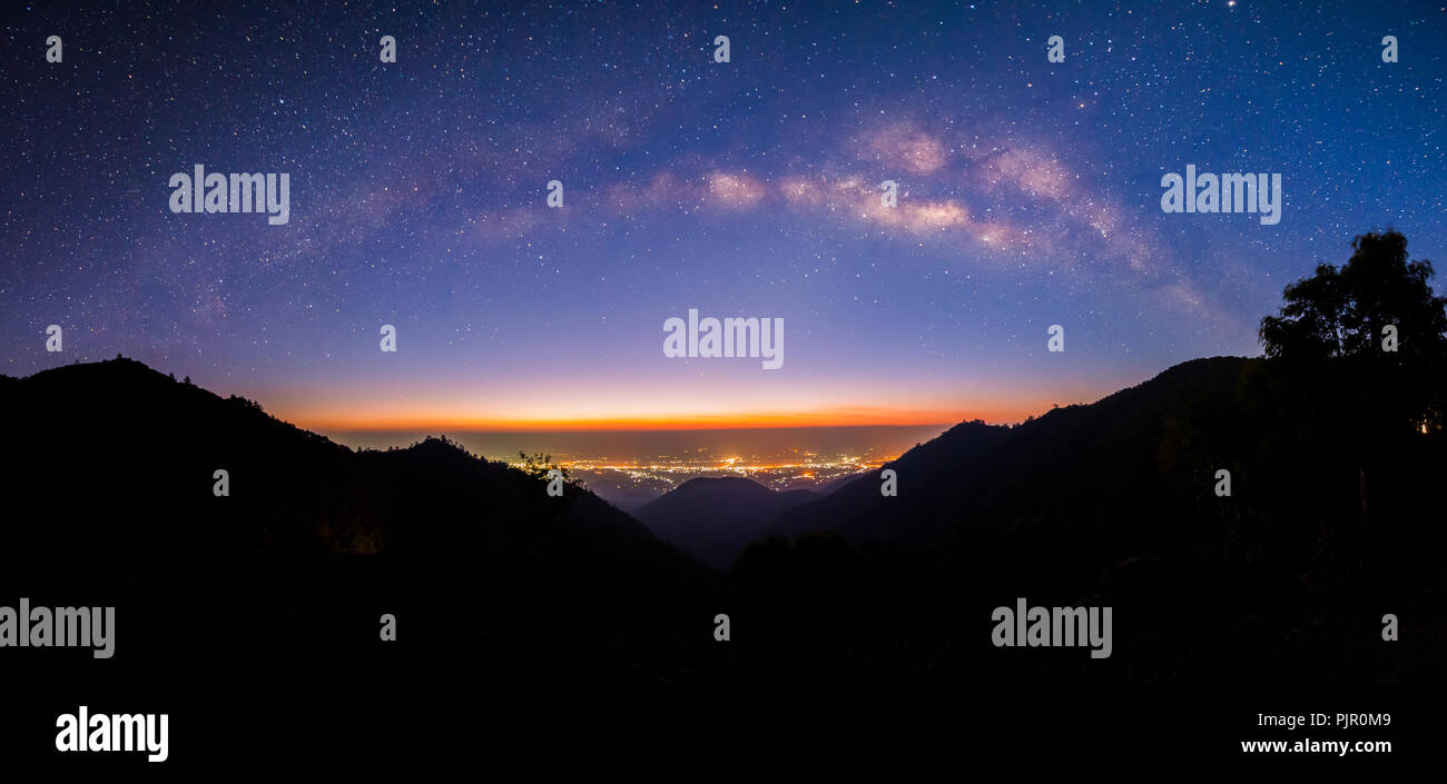Panoramic Milky way at Doi Ang Khang , Chiang Mai , Thailand , Low Light , High ISO Stock Photo
