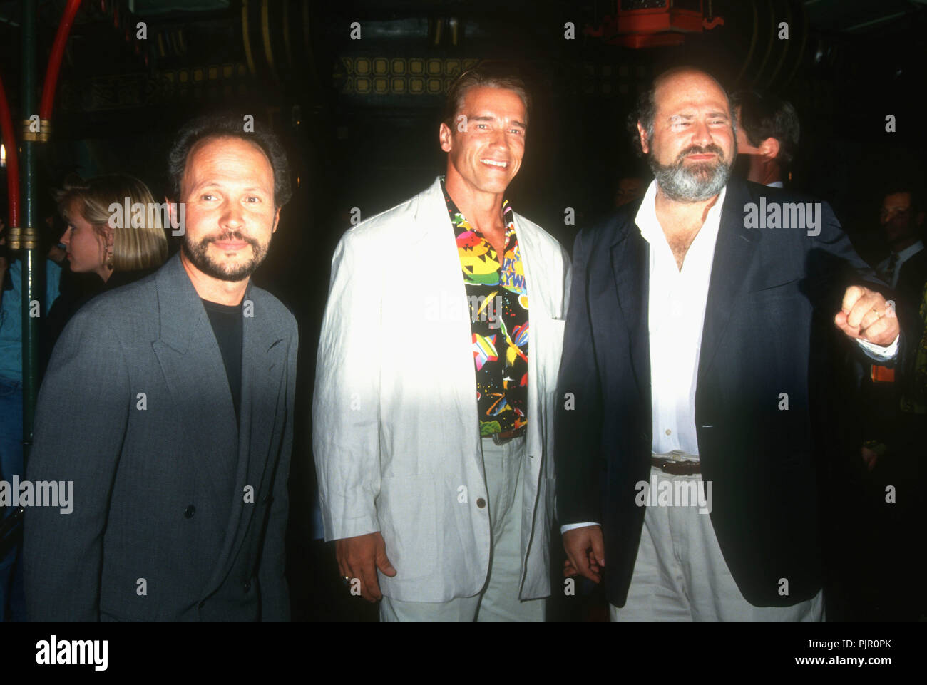 HOLLYWOOD, CA - SEPTEMBER 22: (L-R) Actors Billy Crystal, Arnold Schwarzenegger and Rob Reiner attend the 'Mr. Saturday Night' Hollywood Premiere on September 22, 1992 at Mann's Chinese Theatre in Hollywood, California. Photo by Barry King/Alamy Stock Photo Stock Photo