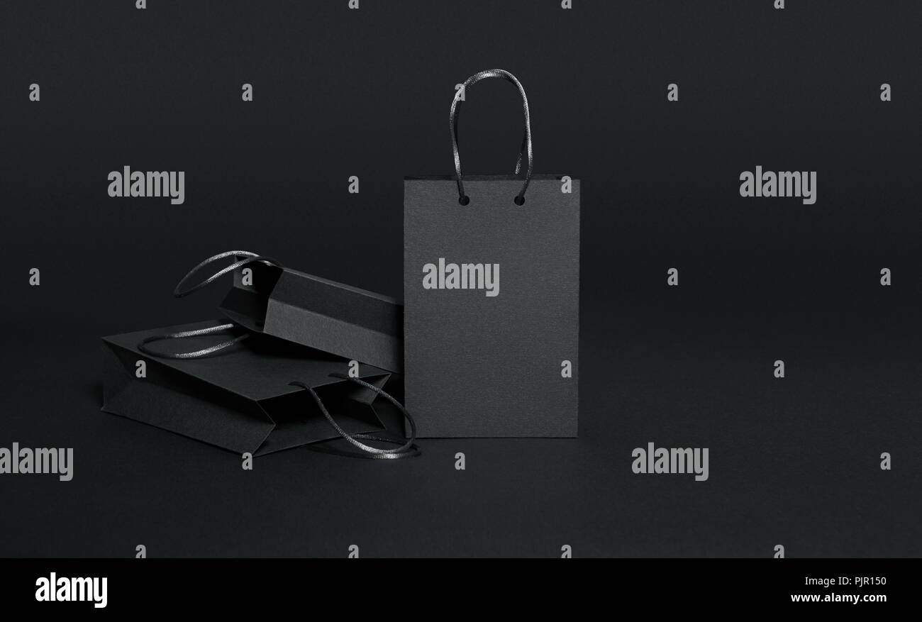 Black shopping bags hi-res stock photography and images - Alamy