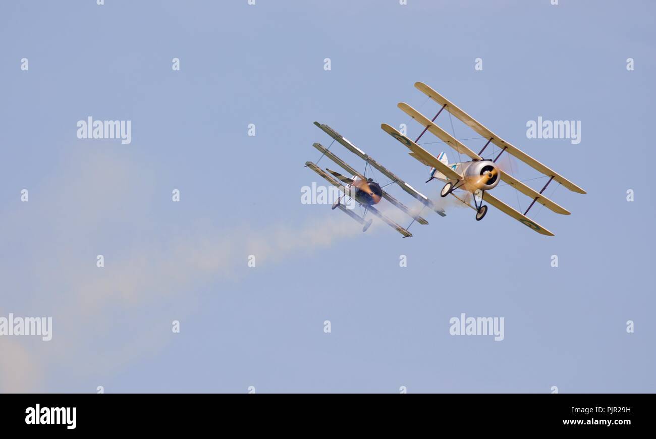Bremont Great War Display Team - Fokker Dr1 and Sopwith Triplane re-enactment of a World War I aerial dogfight Stock Photo