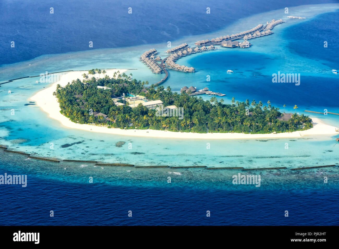 Maldives island vacation paradise sea Halaveli Resort Ari Atoll aerial photo tourism Stock Photo