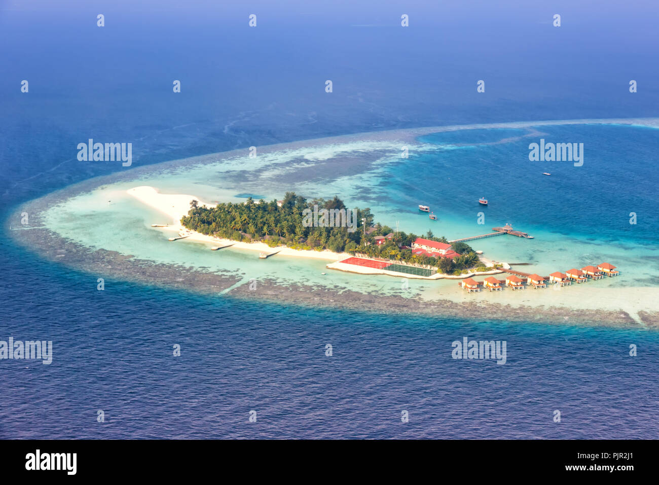 Maldives island vacation paradise sea copyspace Maayafushi Resort Ari Atoll aerial photo tourism Stock Photo