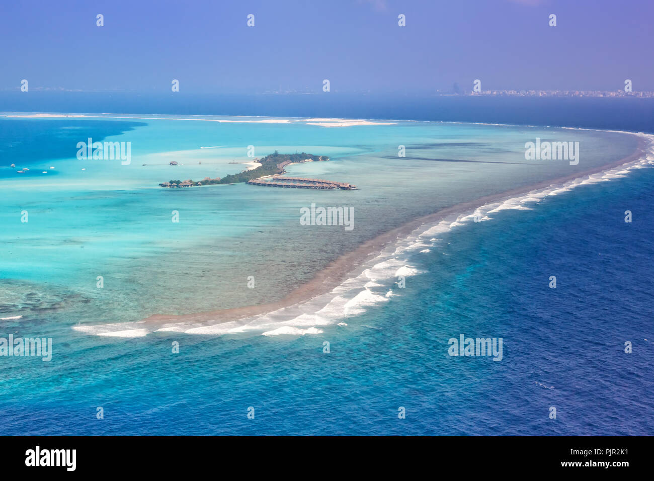 Maldives vacation paradise sea island atoll lagoon aerial photo tourism Stock Photo