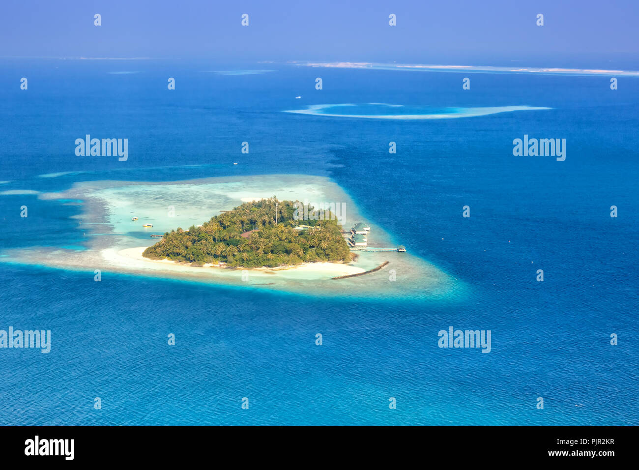 Island Maldives vacation paradise sea Embudu Resort aerial photo tourism Stock Photo