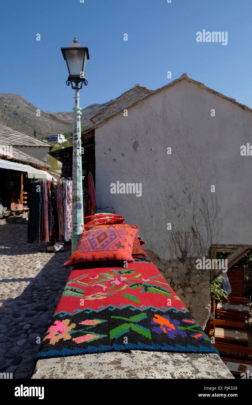 Bosnian rugs and cushions for sale at Mostar, Bosnia and Herzegovina. Stock Photo