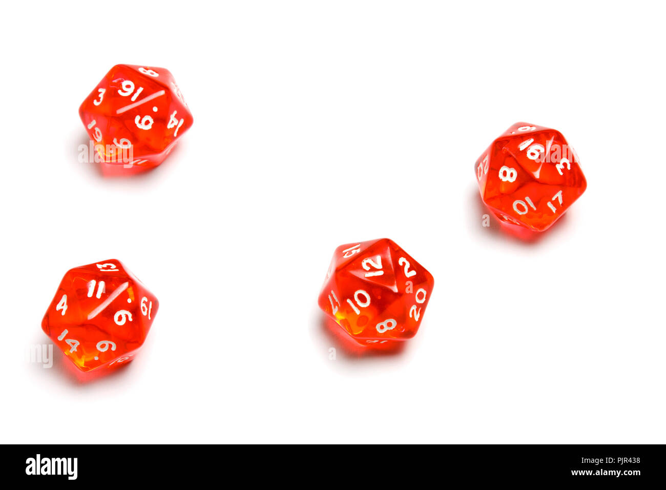 Twenty Sided Dices (d4) translucent in red. Stock Photo