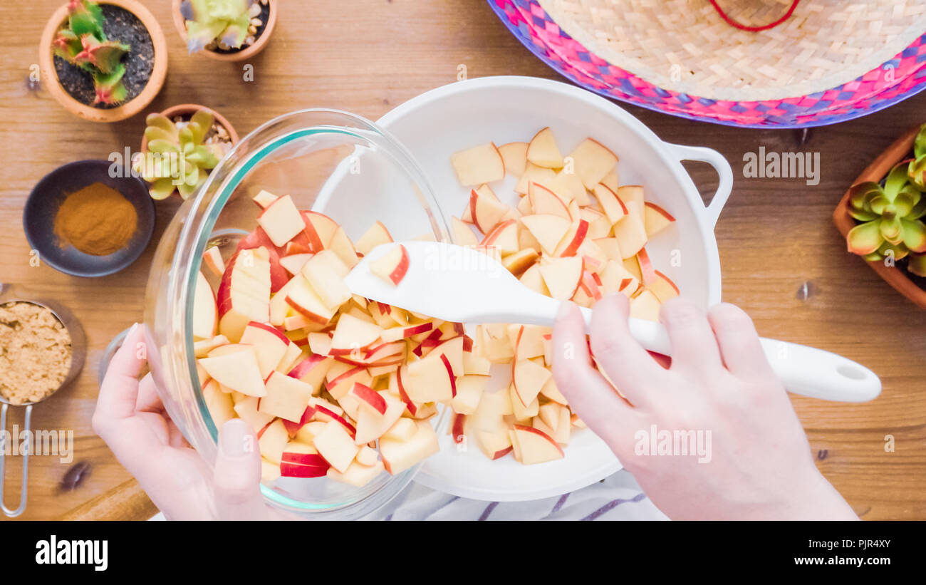 Step by step. Frying red apples with brown sugar for filling to make