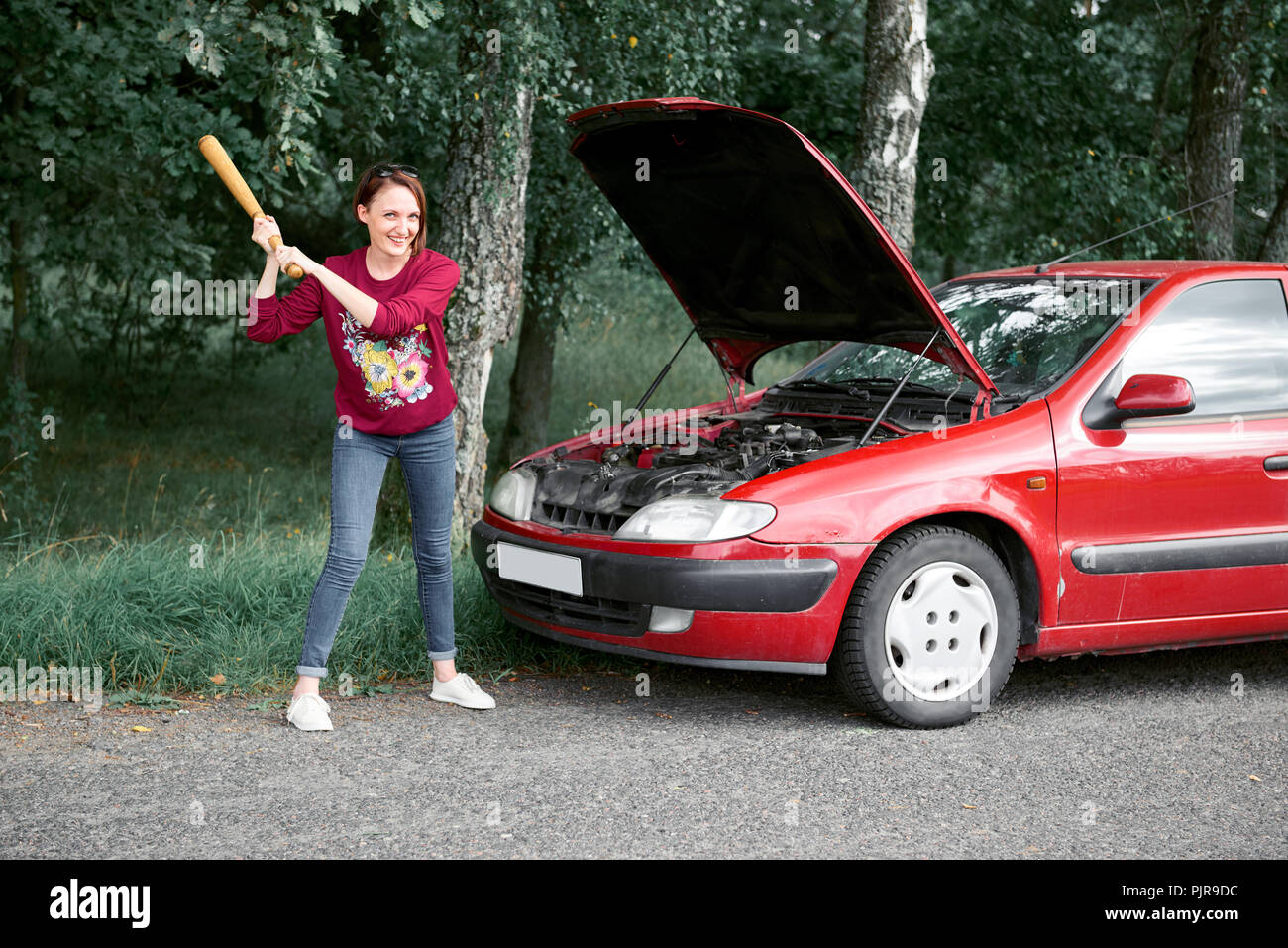 Young angry woman baseball bat hi-res stock photography and images - Alamy