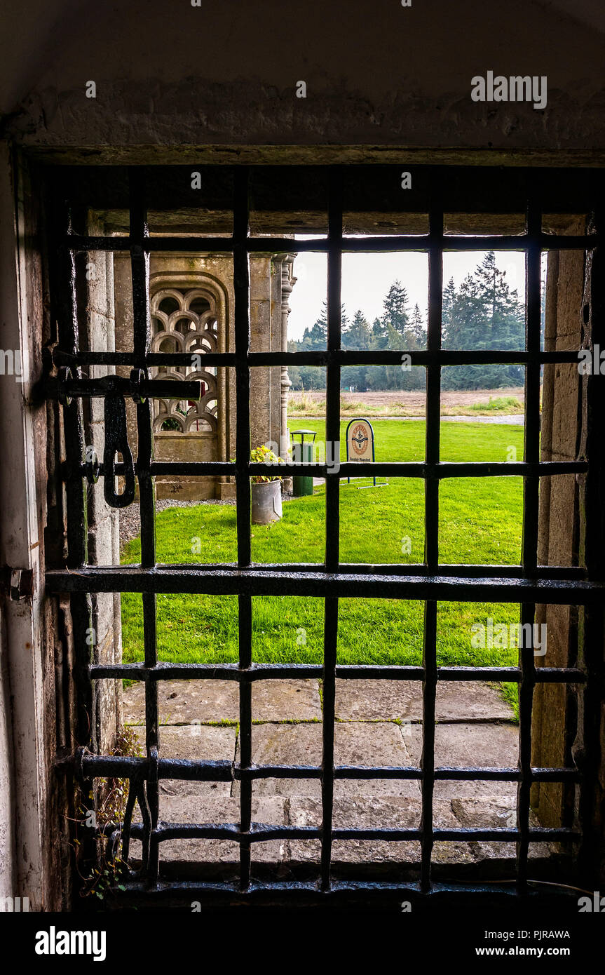 An iron Yett (gate) which together with a heavy wooden door barred the original entrance to the castle Stock Photo