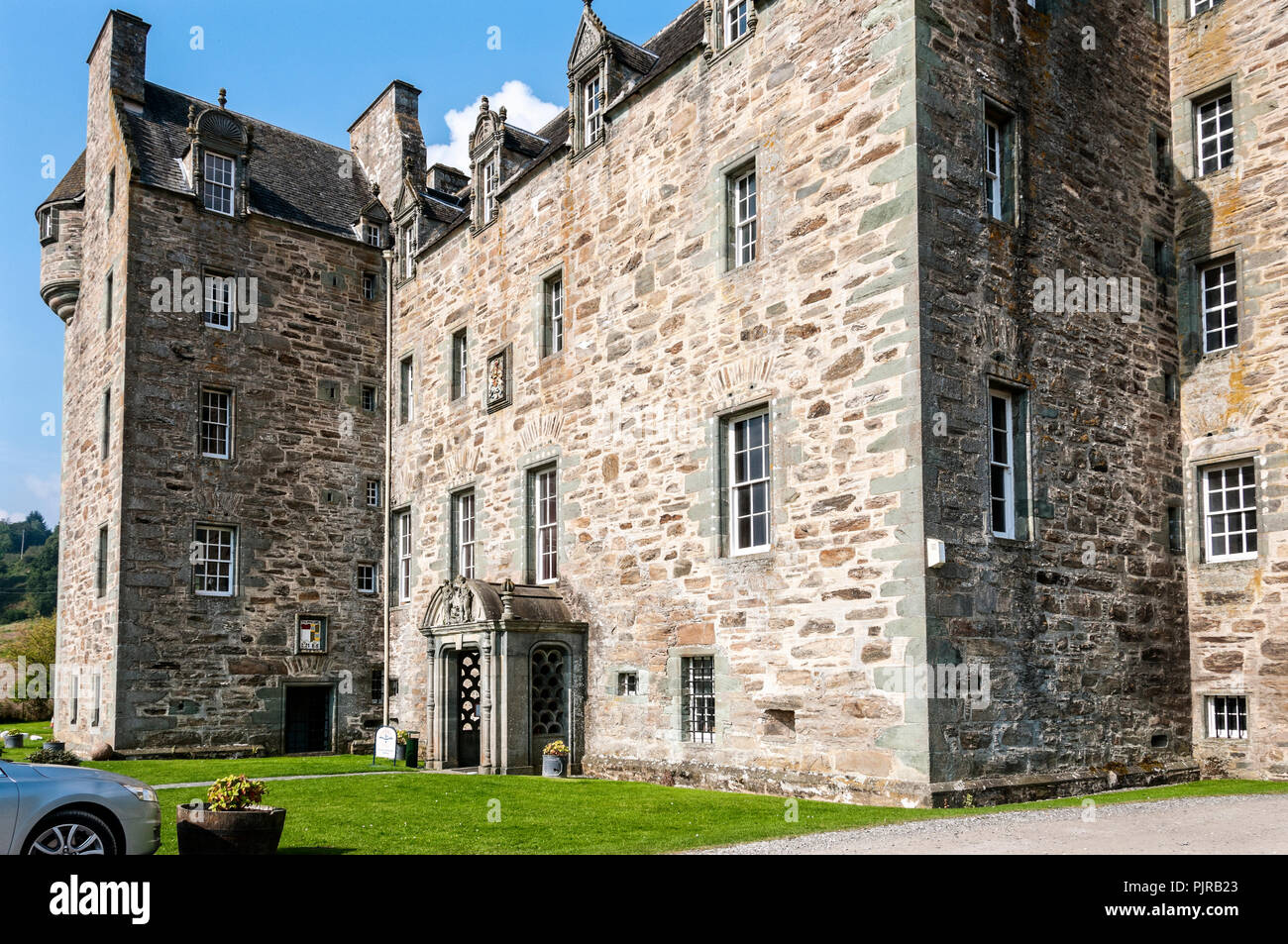 The dramatic restored sixteenth century, four storey Castle Menzies, once a rectangular tower but later converted into a Z-plan fortified residence Stock Photo