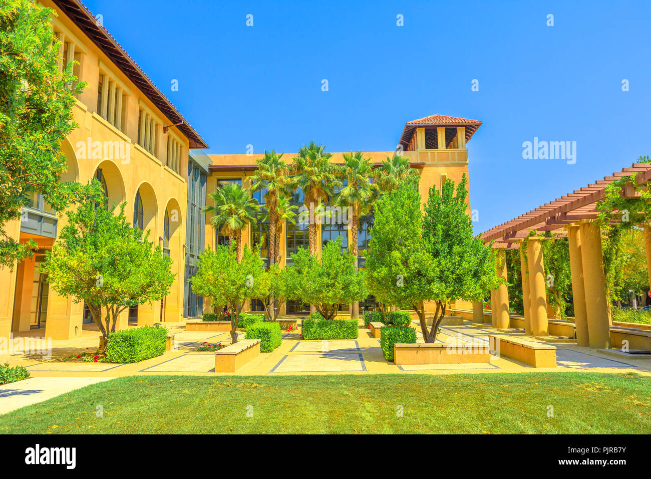 Palo Alto, California, United States - August 13, 2018: courtyard of SIEPR: Stanford Institute Economic Policy Research. Stanford University is one of the most prestigious universities in the world. Stock Photo
