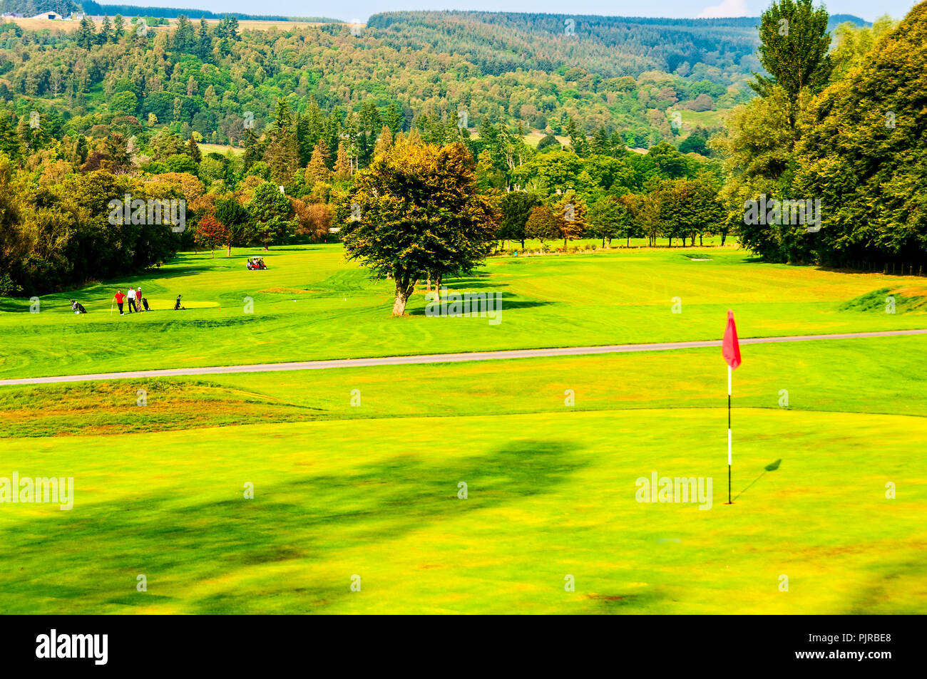 The fairways and greens of Aberfeldy Golf Club glow in the strong