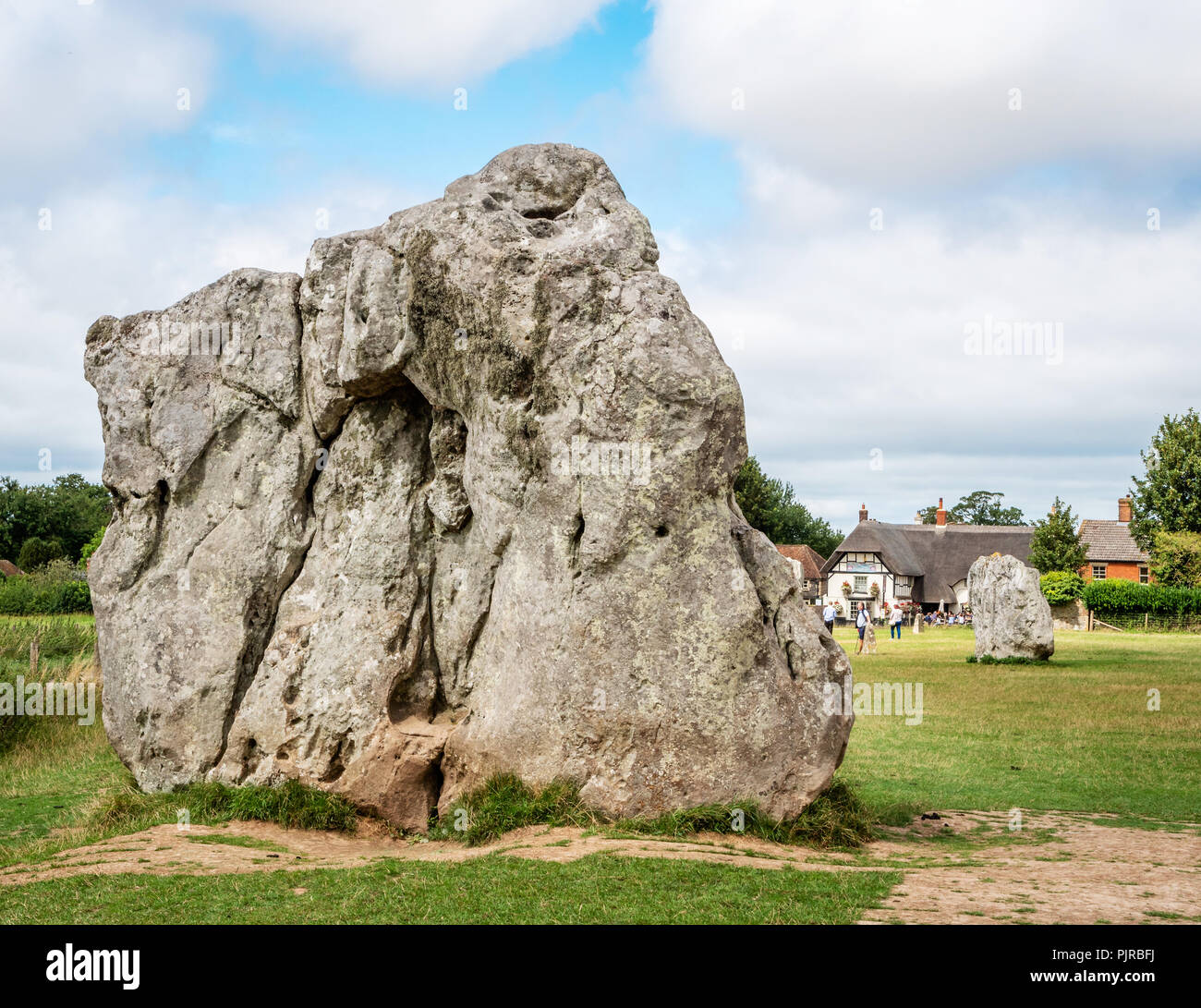 Red Lion pub at Avebury neolithic henge in Wiltshire UK which contains a village a pub and three stone circles within its circumference Stock Photo