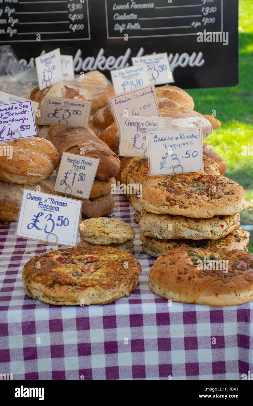 Chelmsford Essex UK  -2 September 2018: Large selection of Artisan home cooked bread with price tags for sale Stock Photo