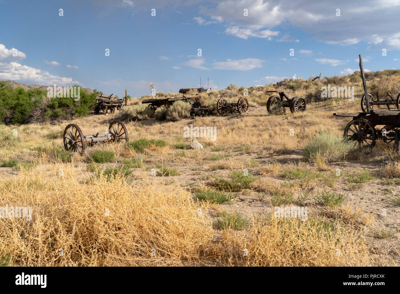 Abandoned rusting and decaying mining equipment in a California desert ghost town from the gold rush. Near Benton Hot Springs California Stock Photo