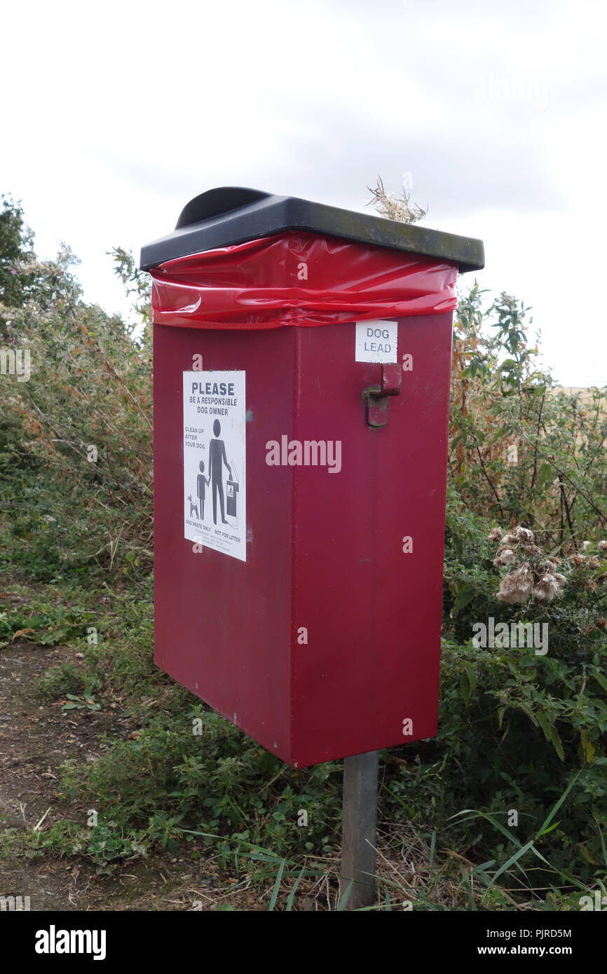 Dog Poo bin near pathway Stock Photo Alamy