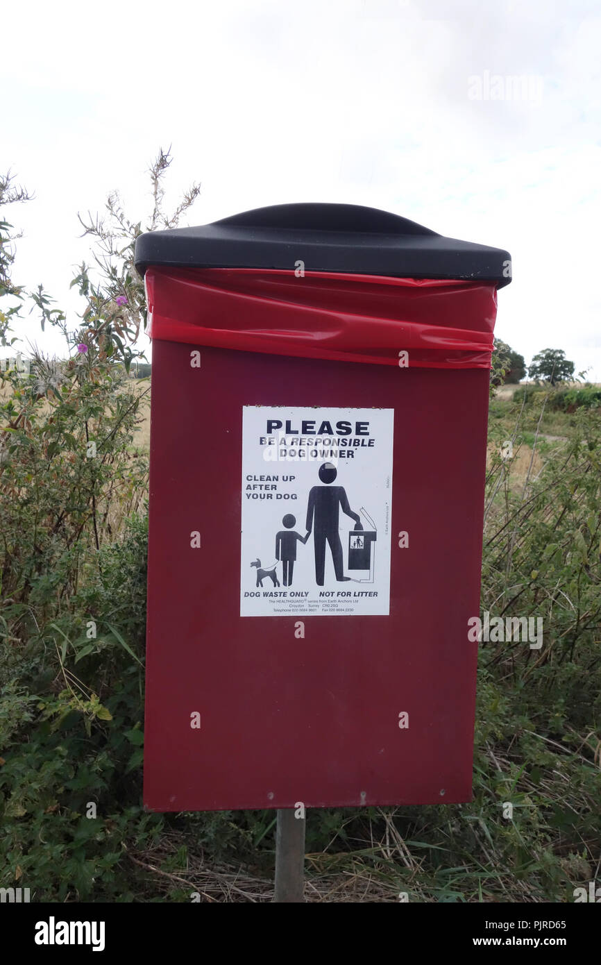 Dog Poo bin near pathway Stock Photo Alamy