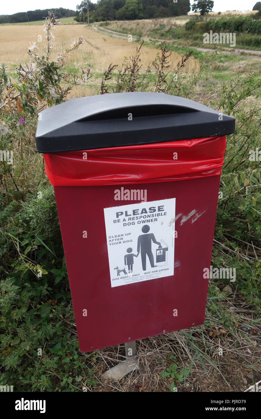 Dog Poo bin near pathway Stock Photo Alamy