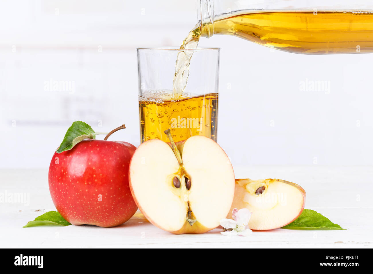Apple juice pouring pour apples fruit fruits copyspace copy space Stock Photo