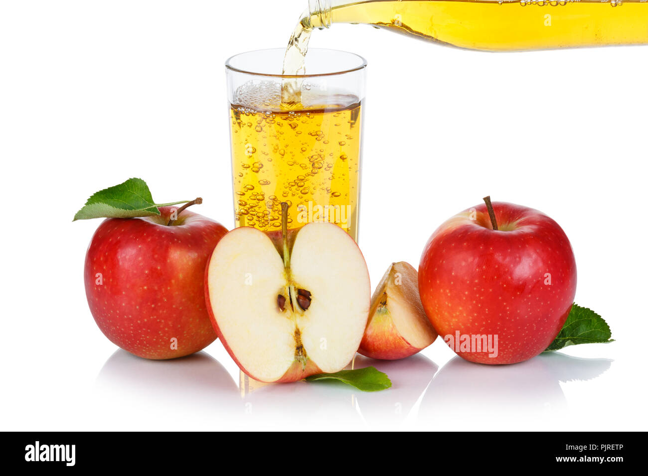 Apple juice pouring pour apples fruit fruits isolated on a white background Stock Photo