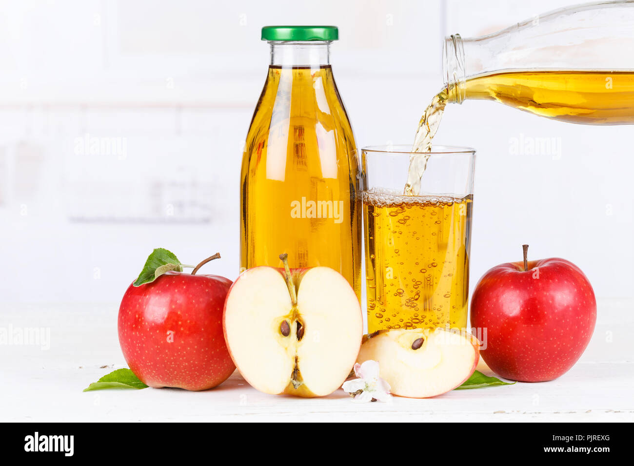 Apple juice pouring pour apples fruit fruits bottle copyspace copy space Stock Photo