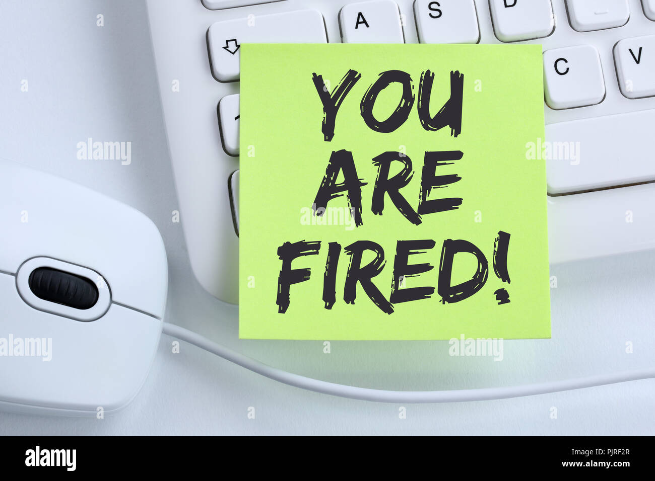 You are fired employee losing jobs, job working unemployed business concept mouse computer keyboard Stock Photo
