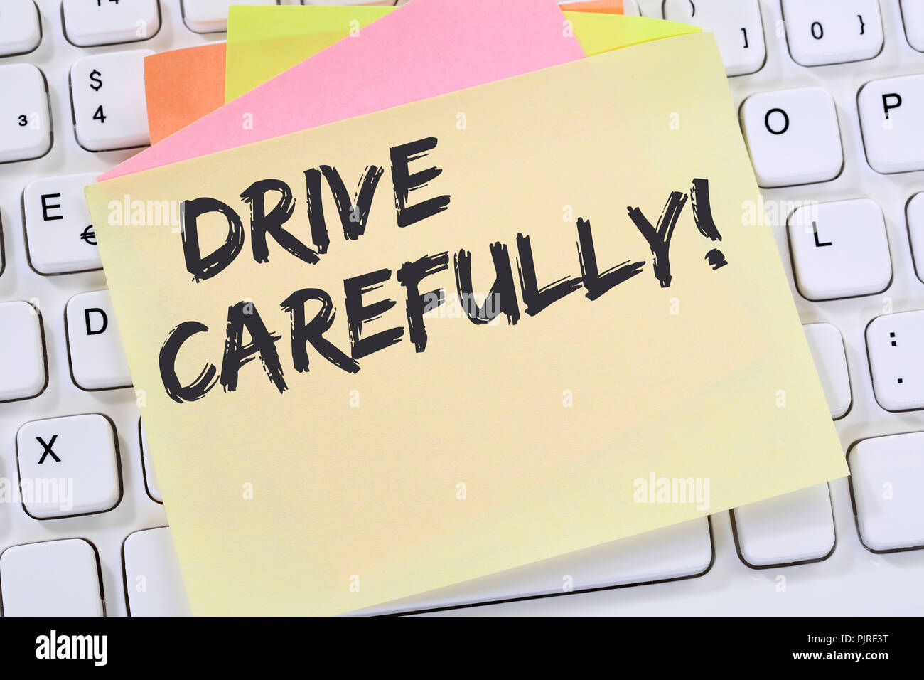 Drive carefully driving car accident traffic notepaper business concept computer keyboard Stock Photo
