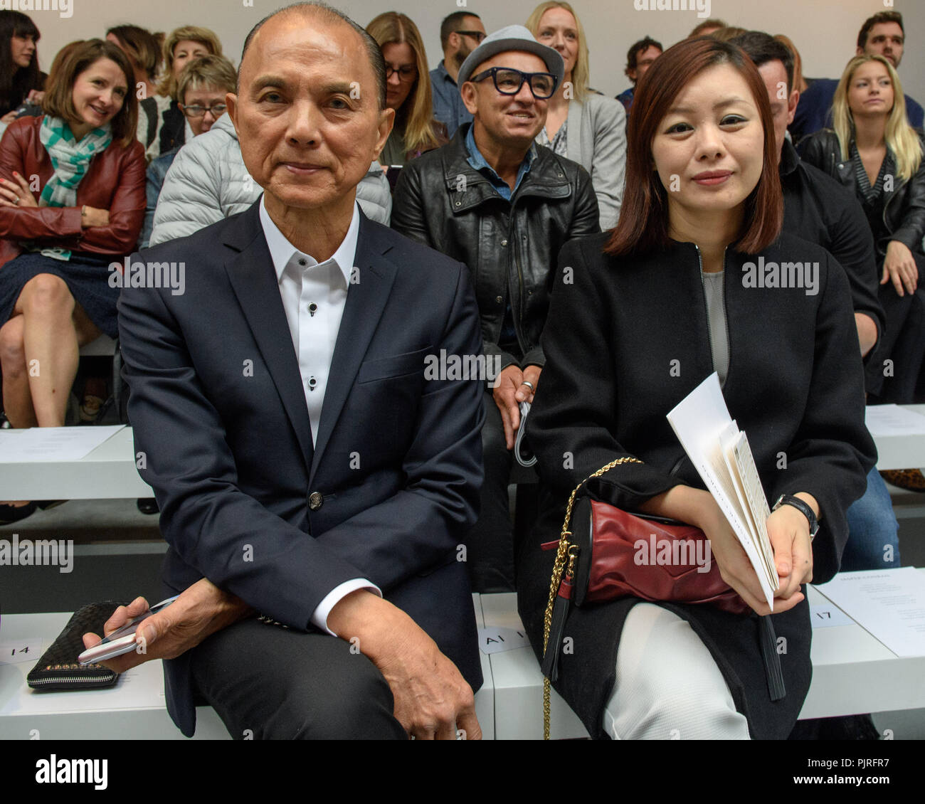 Couture shoe designer Jimmy Choo speaks to the media during the