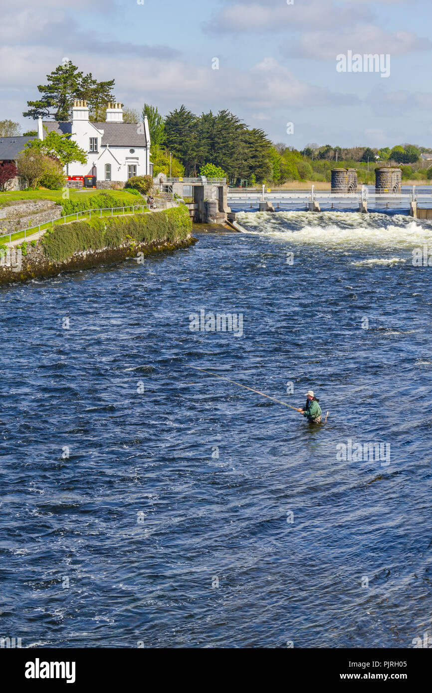 Man fishing in Corrib river near dam, Galway, Ireland Stock Photo Alamy