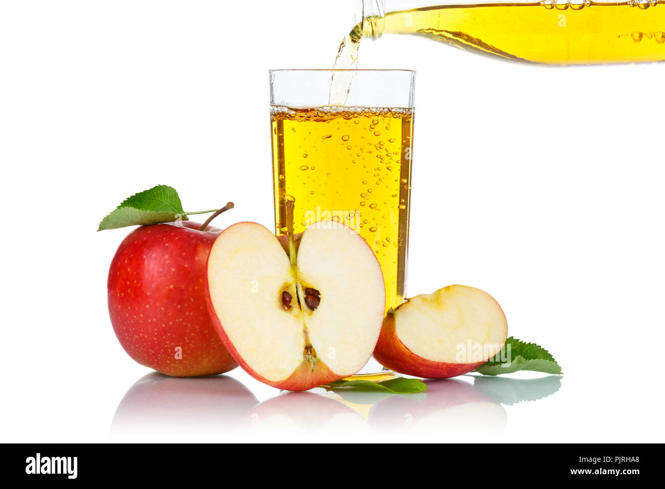 Apple juice pouring pour apples fruit fruits isolated on a white background Stock Photo