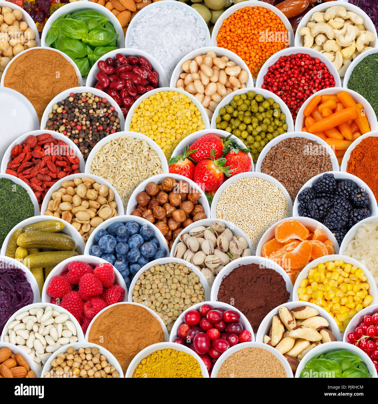 Fruits and vegetables spices ingredients background square berries from above fruit Stock Photo
