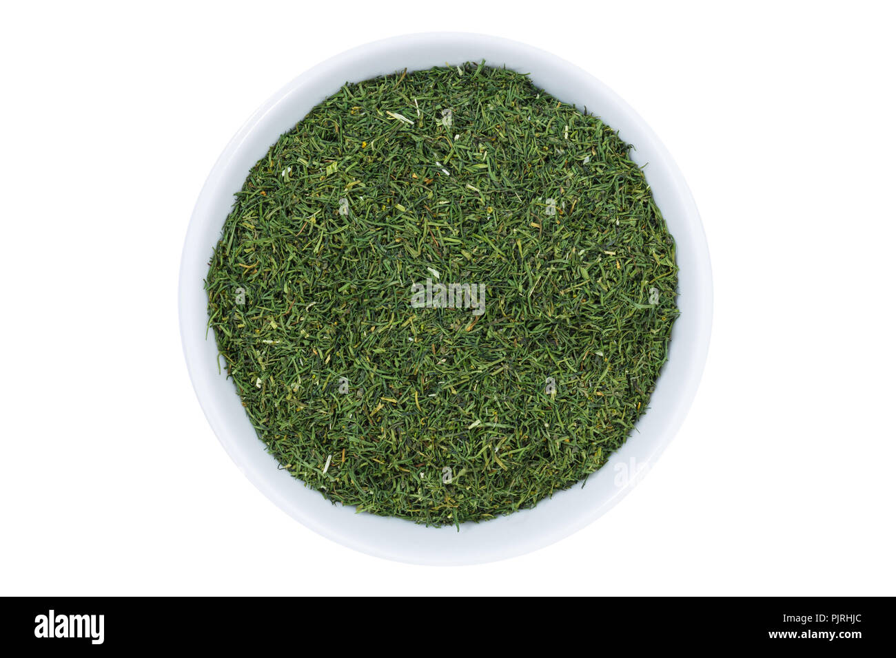 Dill herb from above bowl isolated on a white background Stock Photo