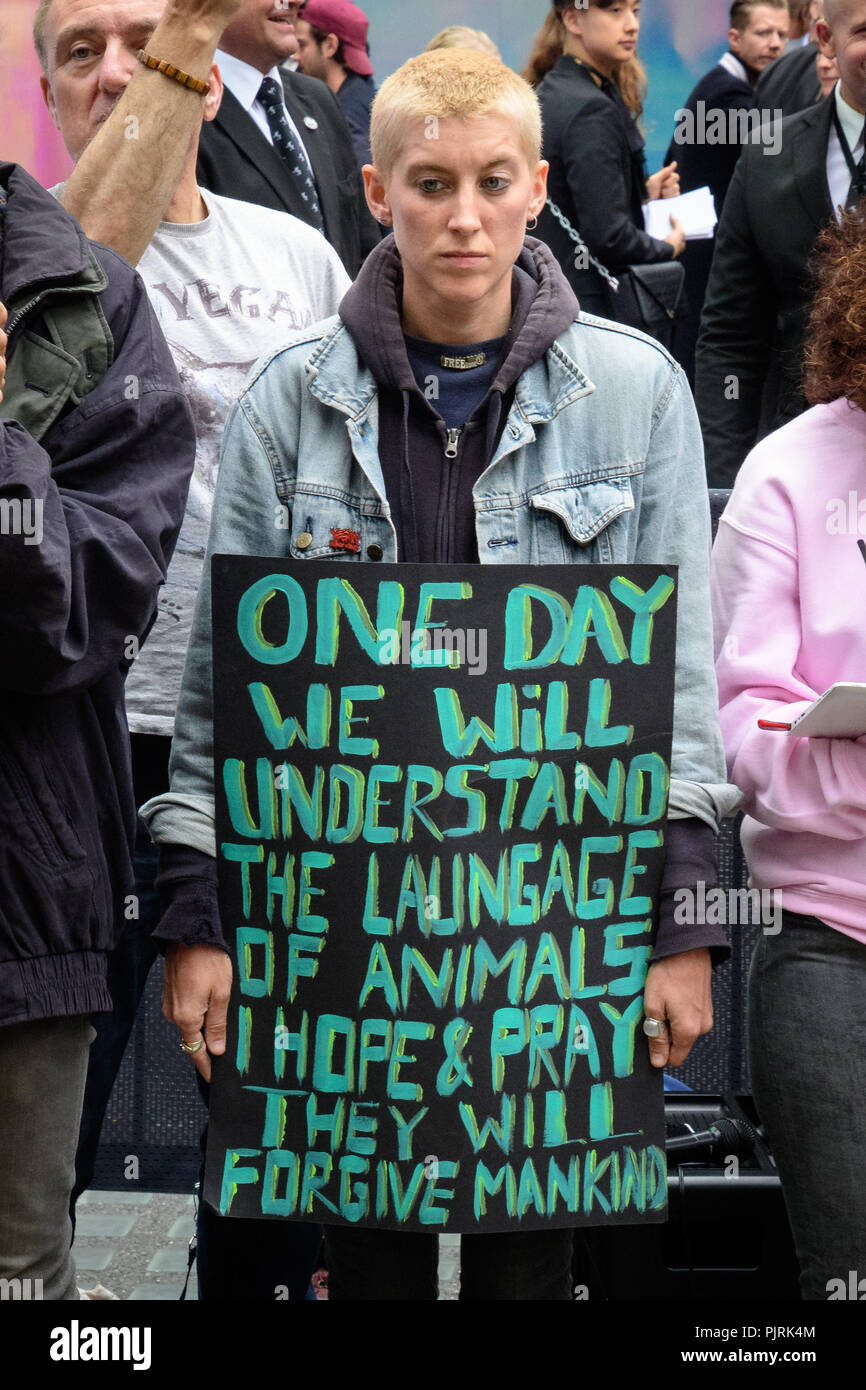Animal cruelty protesters hold signs as they target London Fashion Week's  runway show audiences causing the Metropolitan Police Service to close  roads surrounding the event in London Stock Photo - Alamy