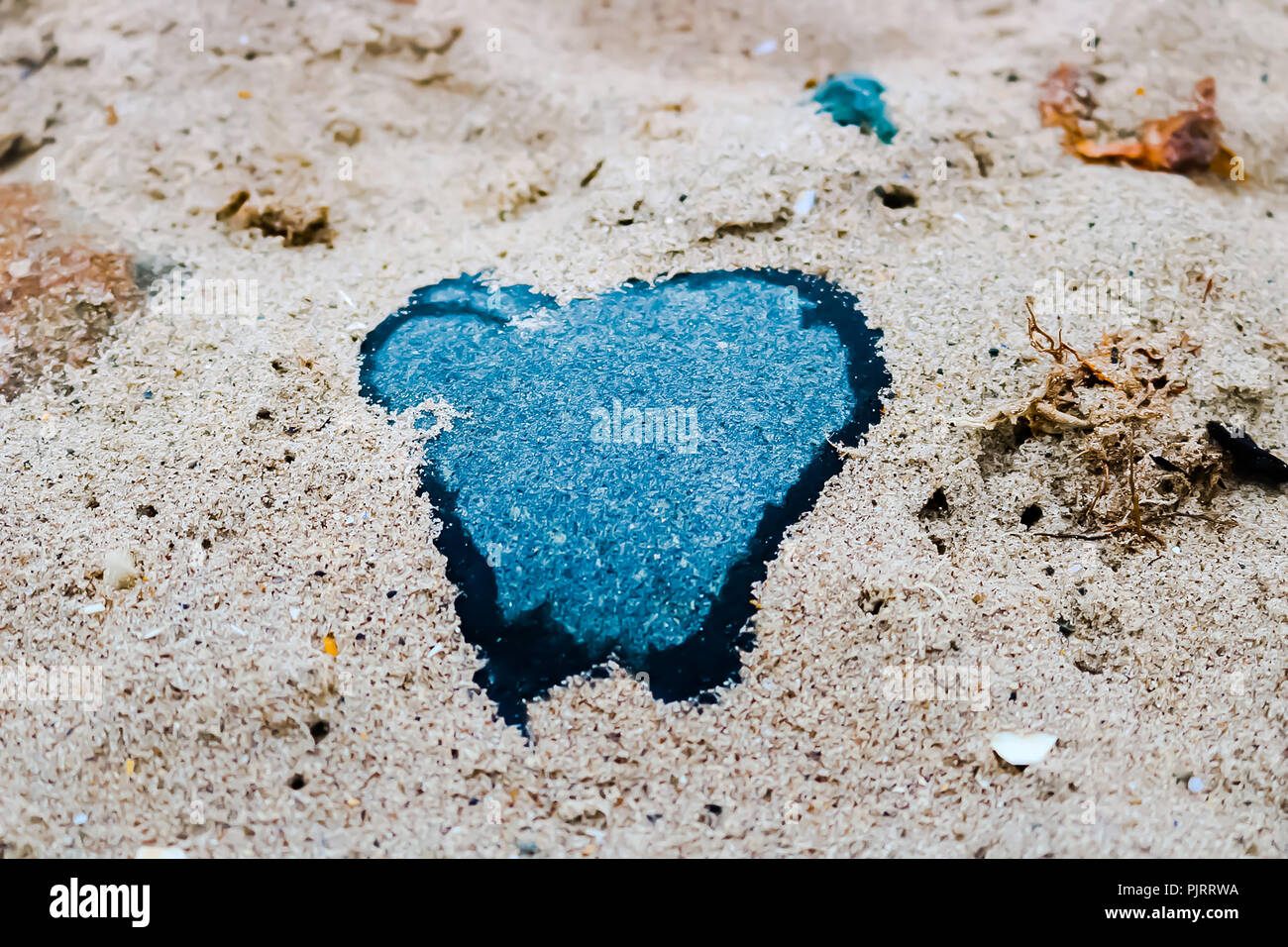 Heart in the sand Stock Photo
