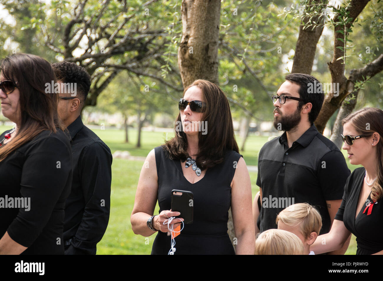 Grieving family funeral hi-res stock photography and images - Alamy