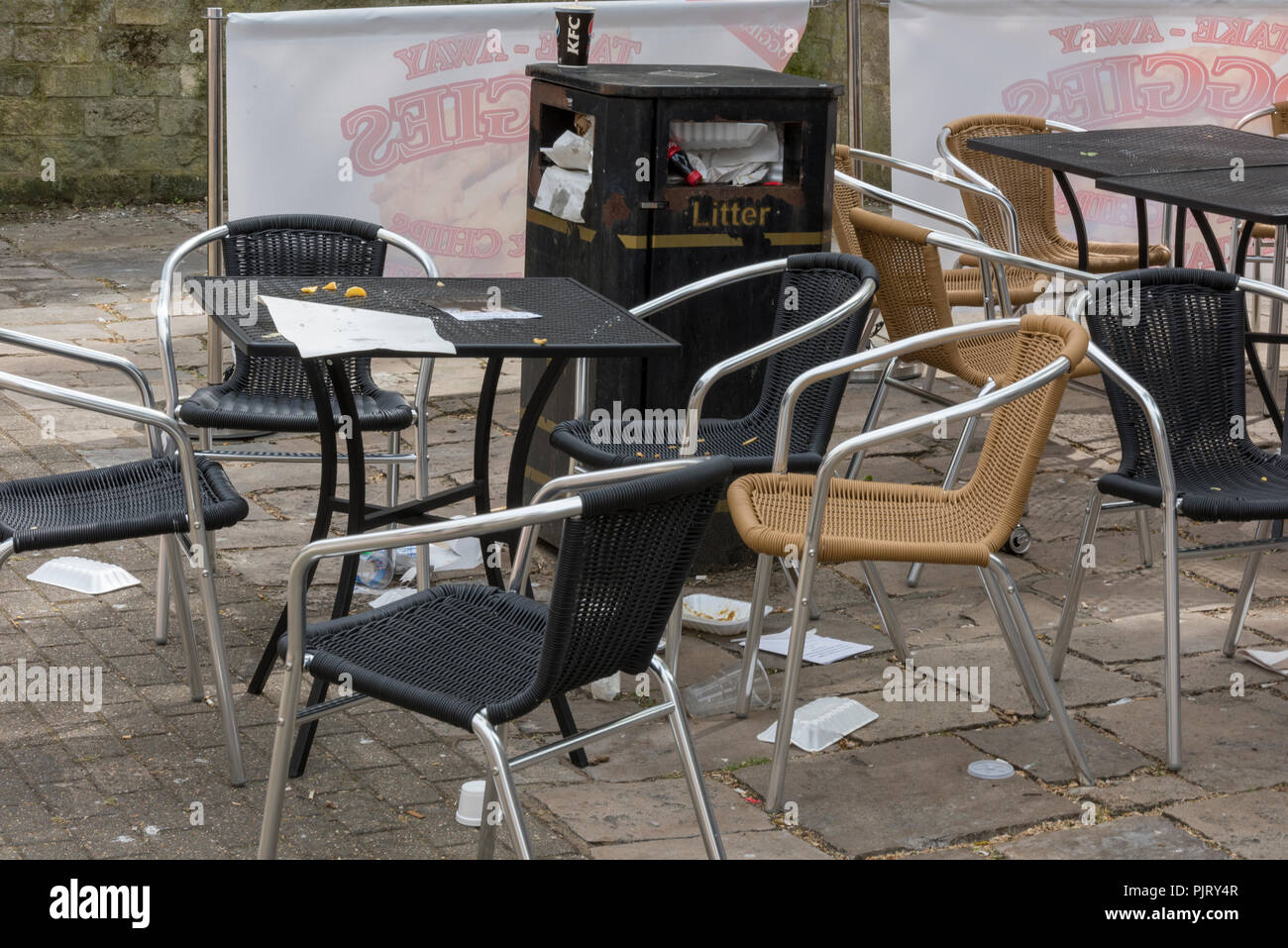littering and rubbish left in a public place in a town centre by