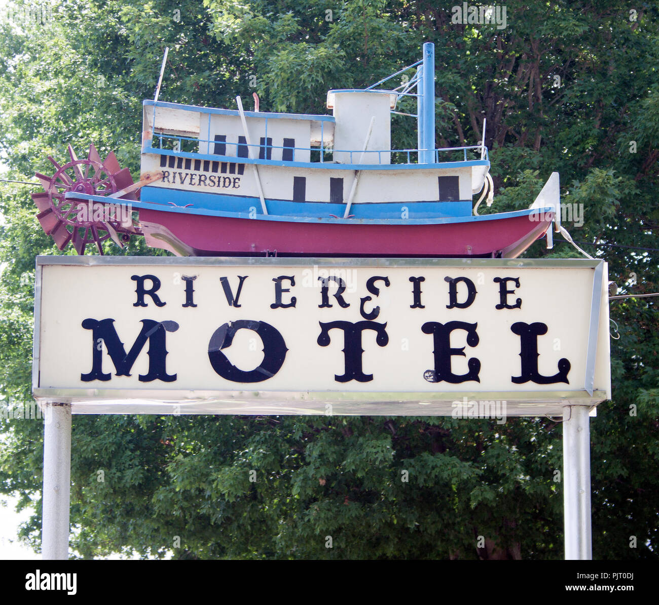 Vintage Riverside Motel sign in Gallipolis, Ohio—classic roadside neon offering a nostalgic glimpse of mid-century travel days. Stock Photo