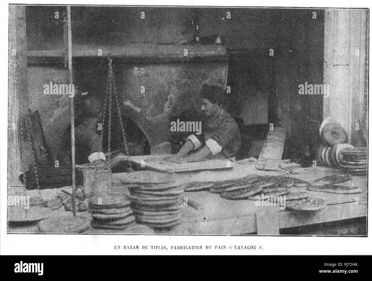 Bazar of Tiflis - A 'lavash' bakery (de Baye). Stock Photo