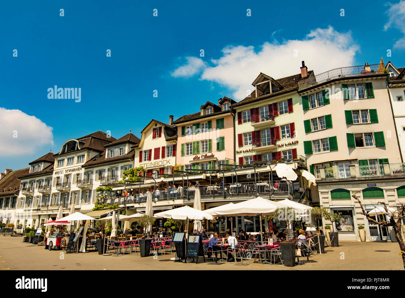 RAPPERSWIL, SWITZERLAND - MAY 18, 2018: Unidentified people sitting in restaurants in Rapperswil, Switzerland. This town located on the upper end of L Stock Photo