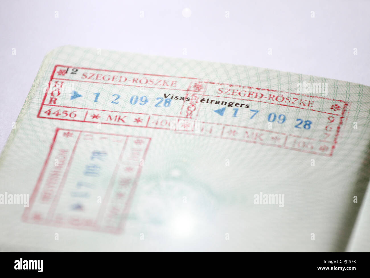 Customs stamps in international passport for traveling around the World